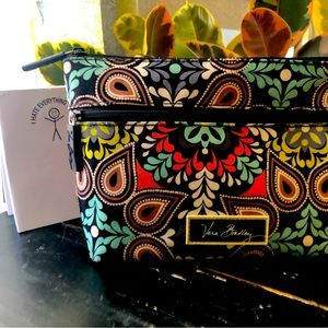 Vera Bradley Nylon water resistant material. Extra pocket on the outside